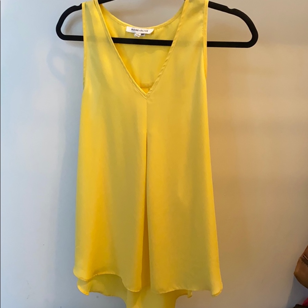 Yellow high-low blouse.